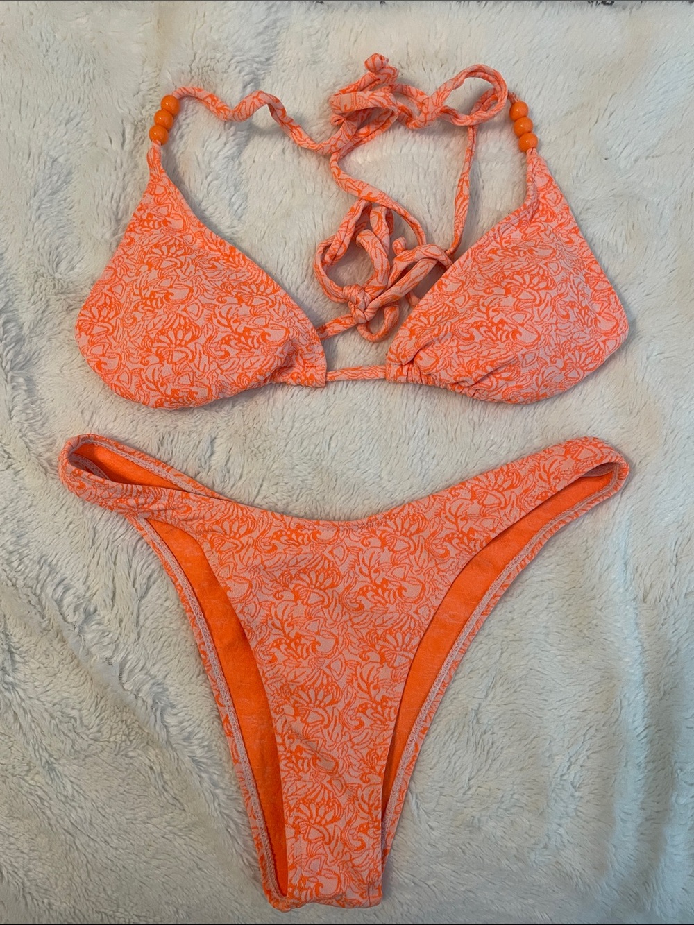 Woman’s Bright Orange Floral two-Piece Swim Suit. Like new.